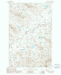 Download a high-resolution, GPS-compatible USGS topo map for Bomber Coulee, MT (1986 edition)