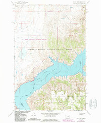 Download a high-resolution, GPS-compatible USGS topo map for Mickey Butte, MT (1987 edition)