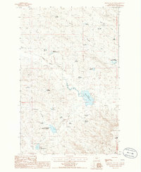Download a high-resolution, GPS-compatible USGS topo map for Miller Coulee West, MT (1986 edition)