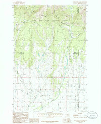 Download a high-resolution, GPS-compatible USGS topo map for Snow Saucer Coulee, MT (1986 edition)