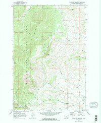 Download a high-resolution, GPS-compatible USGS topo map for Woodhurst Mountain, MT (1973 edition)